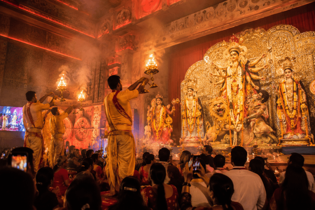 Pandit performing ganga aarti at durga pooja